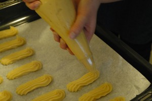 Pipe Éclairs on the baking tray